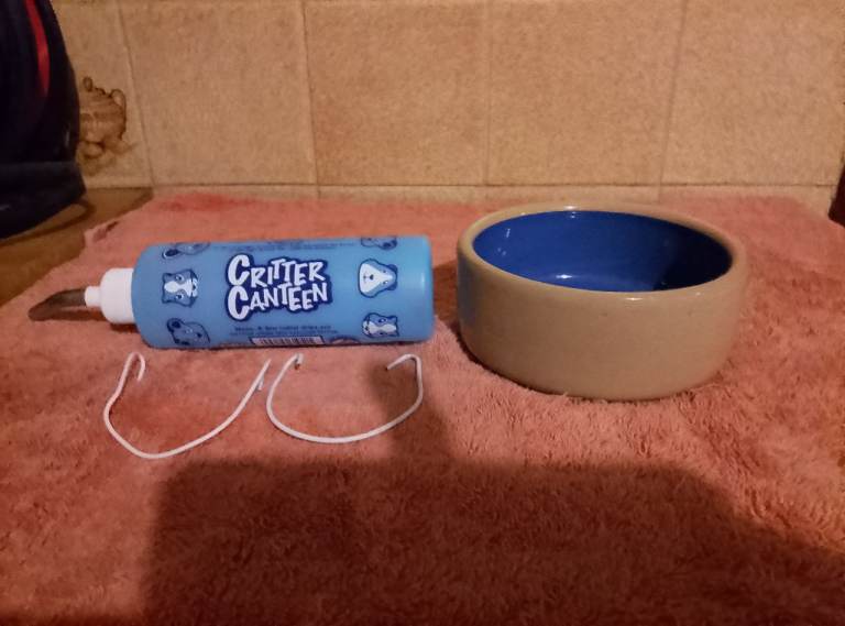 Rabbit/guinea pig bowl and water dispenser,50p each