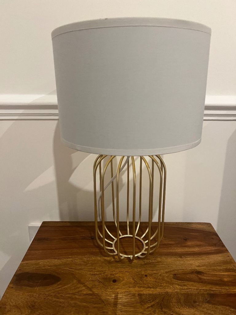Table lamp with gold finishings