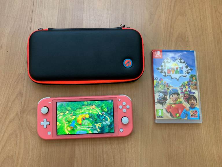 Nintendo Switch Lite (Coral) with Case and Game 