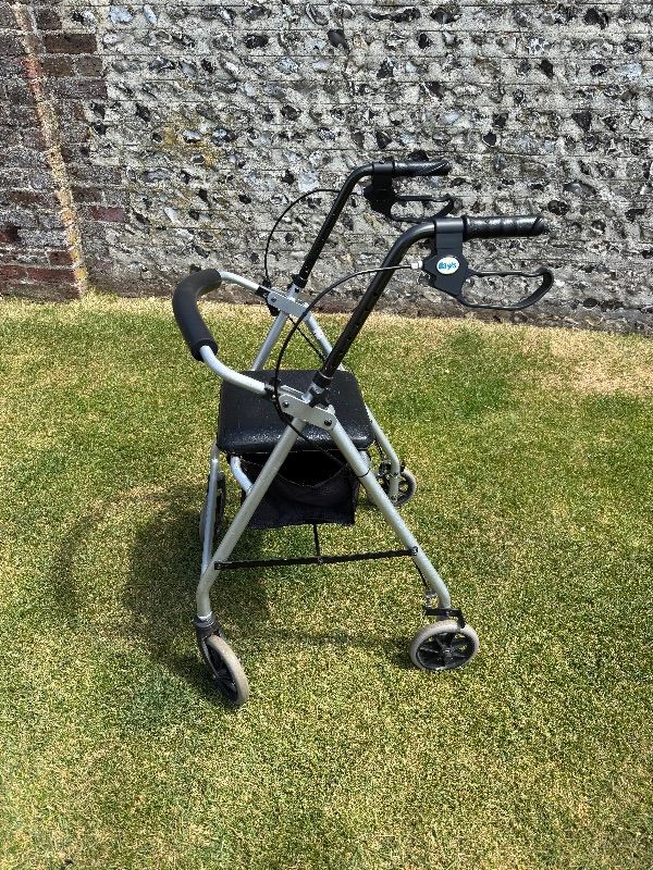 Walker with storage seat