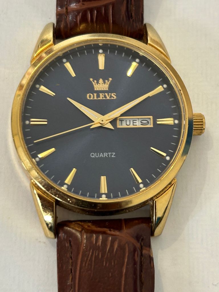 Men’s Watch “OLEVS” in good working order 