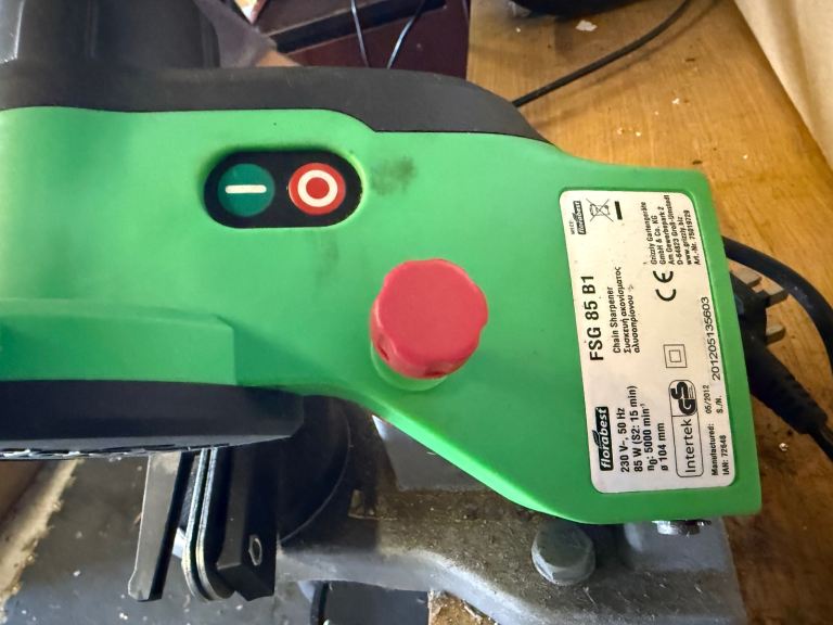 Bench mounted electric chainsaw sharpener