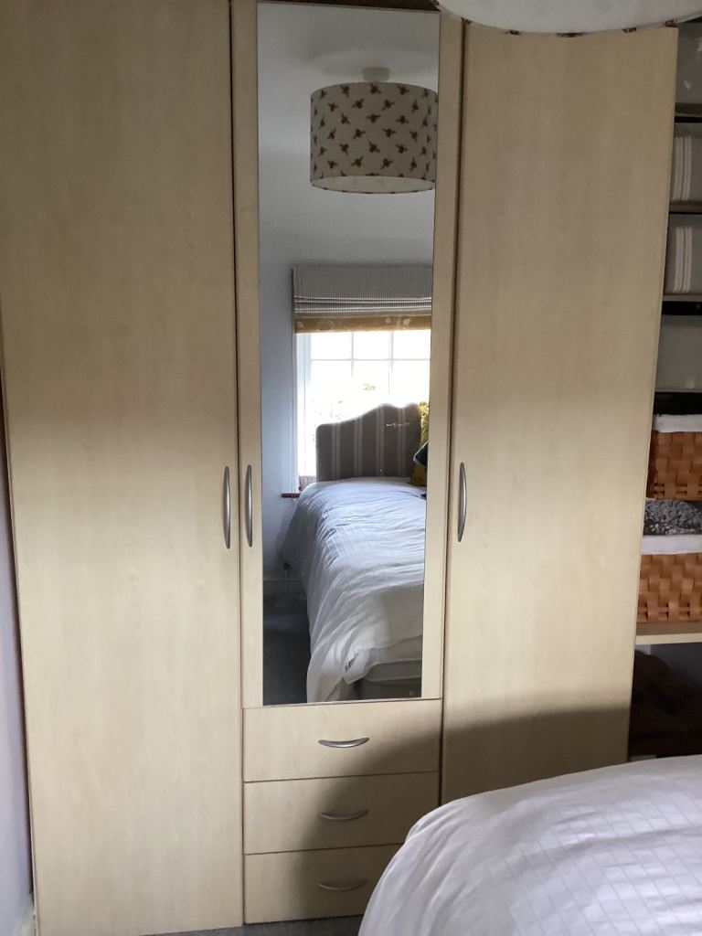 Free.  Triple wardrobe with drawers