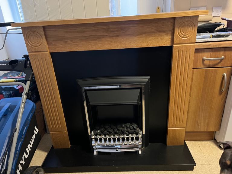 Fireplace with electric fire 