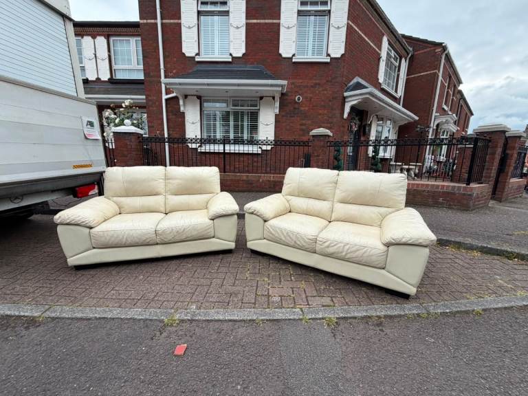 2 2 seater sofas in a cream leather   Couple of wee marks  Hence the price   Inly £199