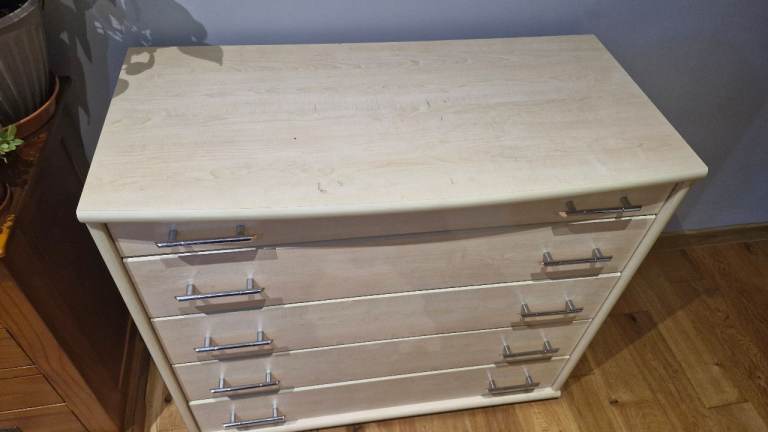 5 drawers chest of drawers.  Light cream colour.  