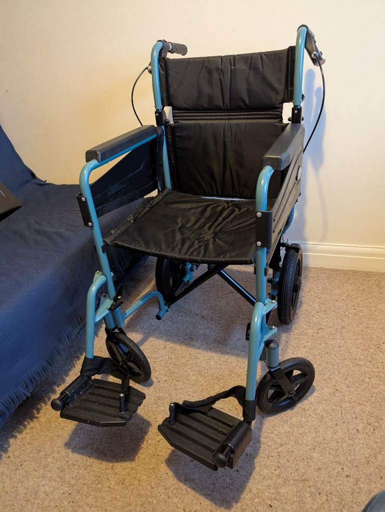 Adult Foldable Wheelchair - excellent condition
