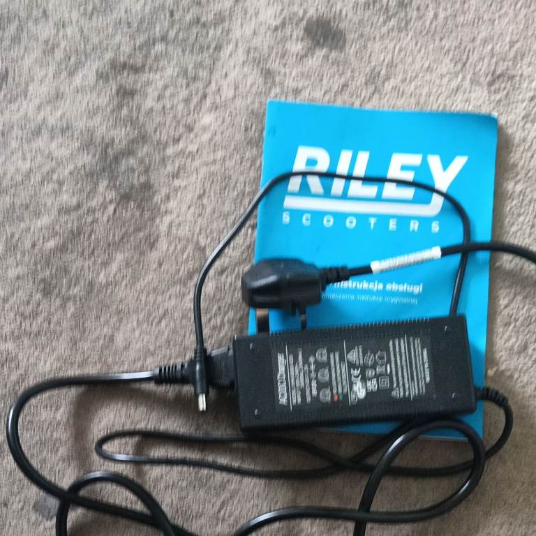 Riley Scooter Charger and Manual – Good Condition