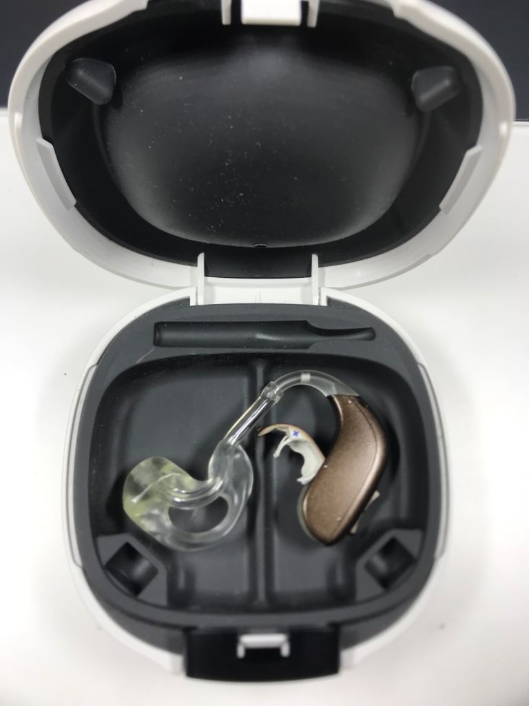 Oticon L Side Hearing Aid with Charging Case - Good Condition