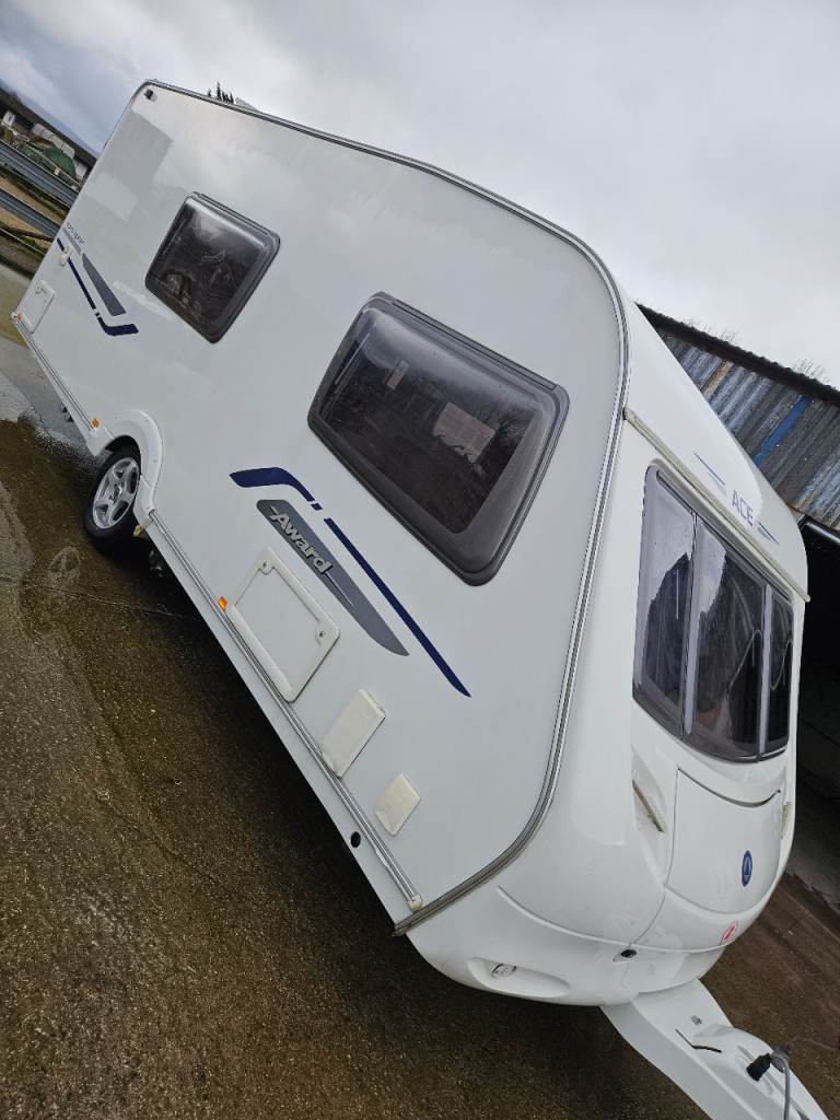 Four berth caravan with motor mover, awning & accessories 