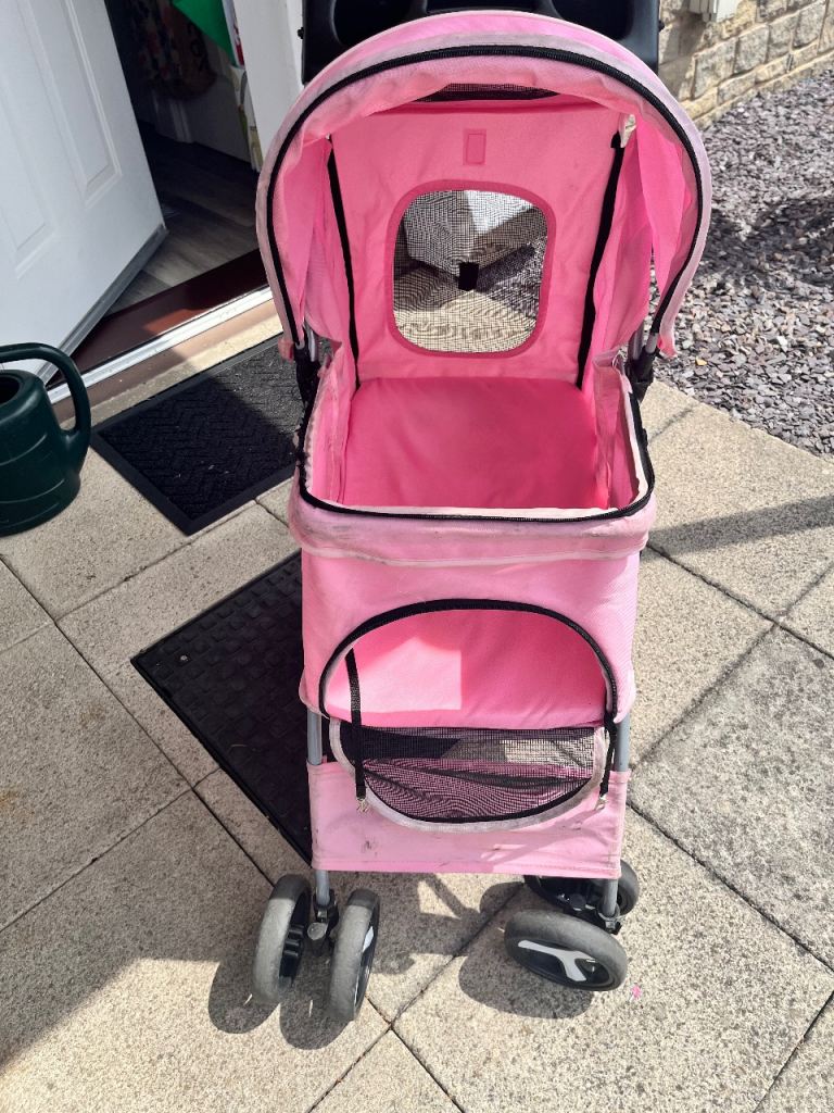 Pink dog pram 