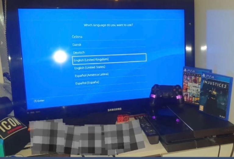 PS4 Console with Controller and 2 Games – Good Condition