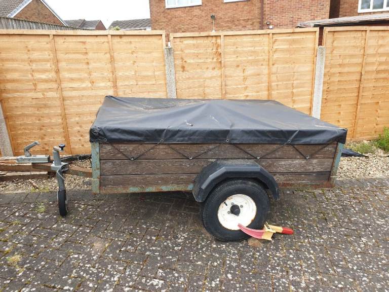 6 x 4 wooden trailer with cover.