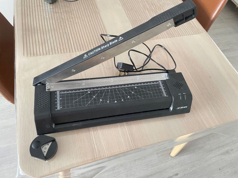 Multipurpose laminator machine paper cutter