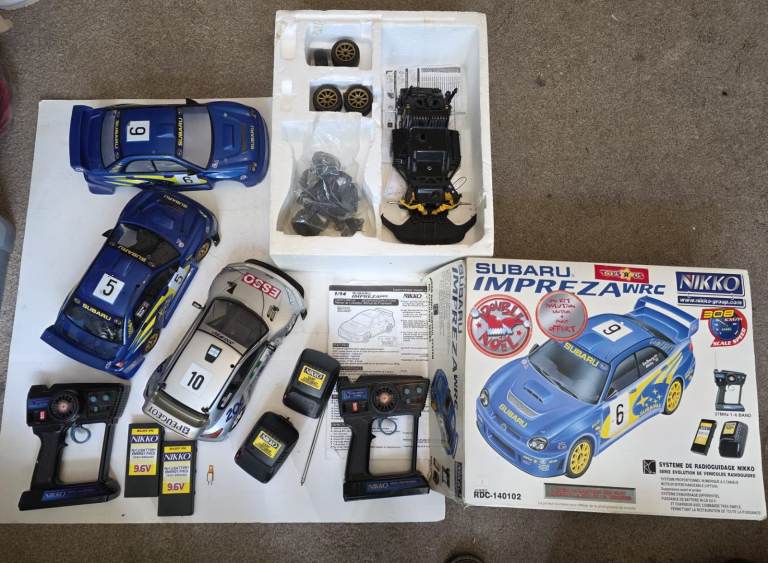2 Nikko Subaru Imprezza WRC RDC-140102 RC Cars 27 MHz Band 5 in working order with a spare one