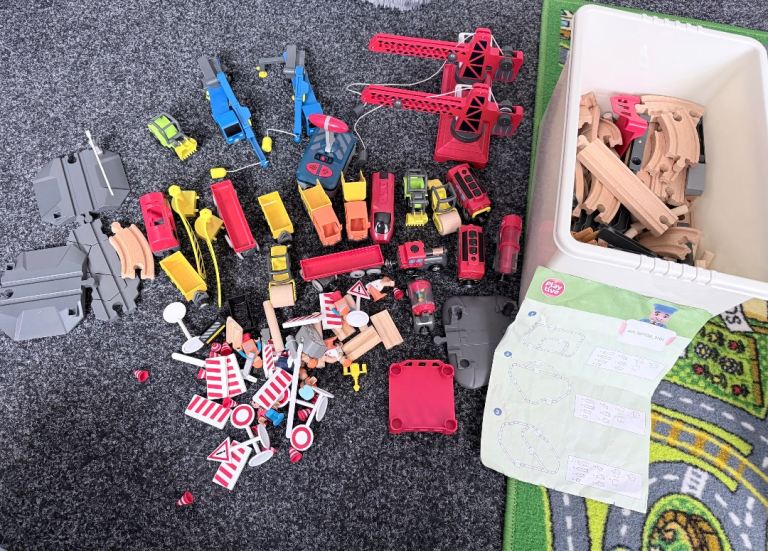 Large Bundle of Kids' Toy Cars, Cranes, and Wooden Train Tracks