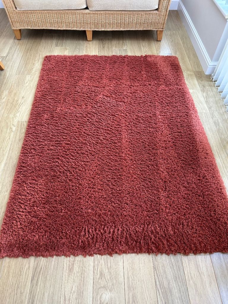 Next large rug, burnt orange/terracotta. 