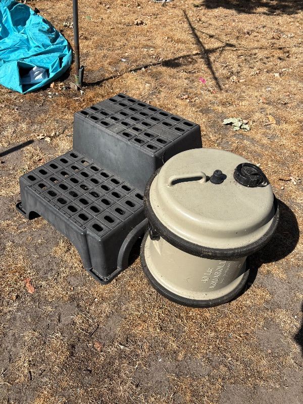 Caravan gear including steps, aqua roll and gas bottles
