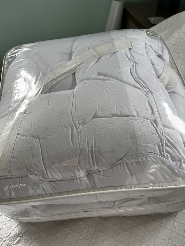 Single 10.5tog duvet and two single mattress toppers. 