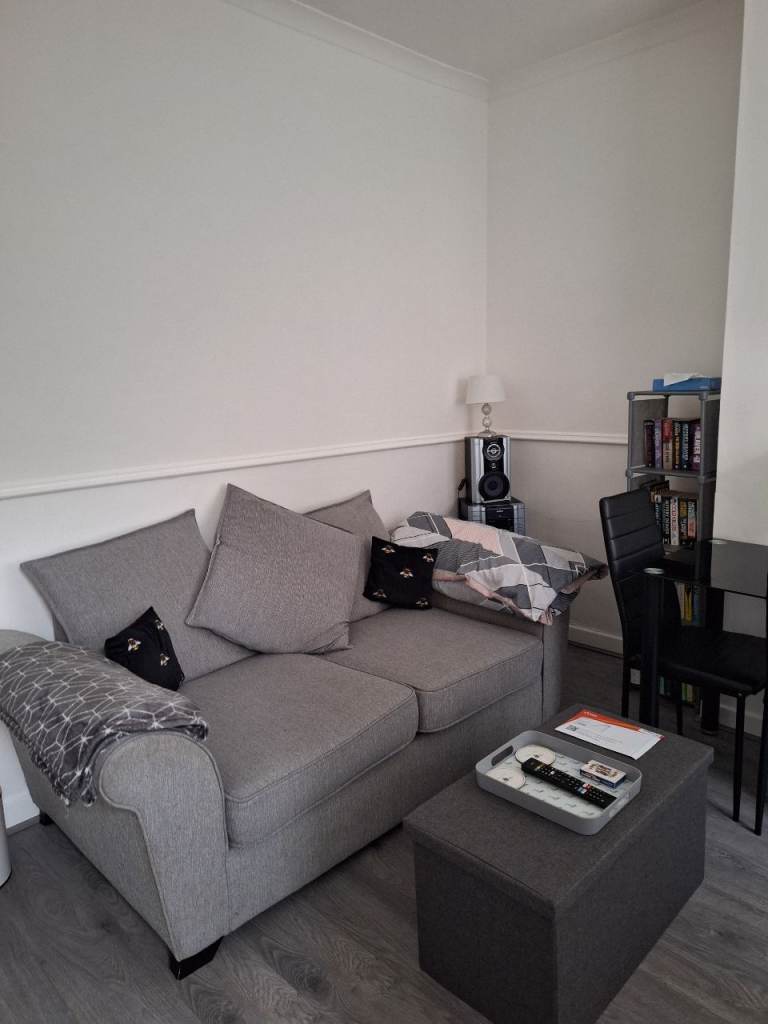 Grey Fabric Sofa – Good Condition