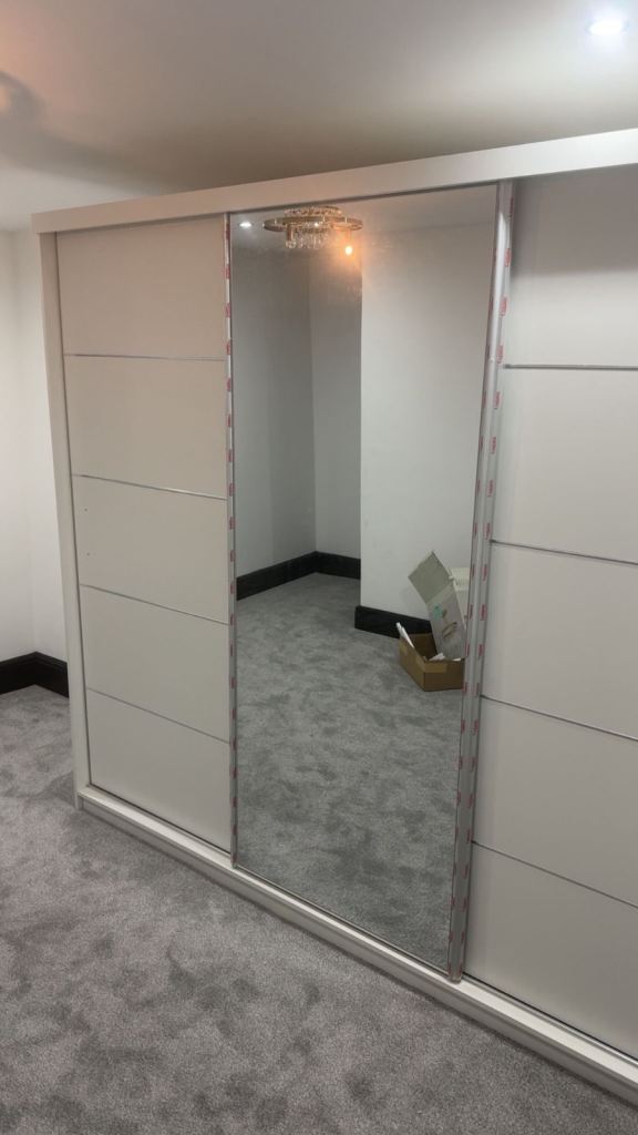 image for Brand new white sliding door wardrobe