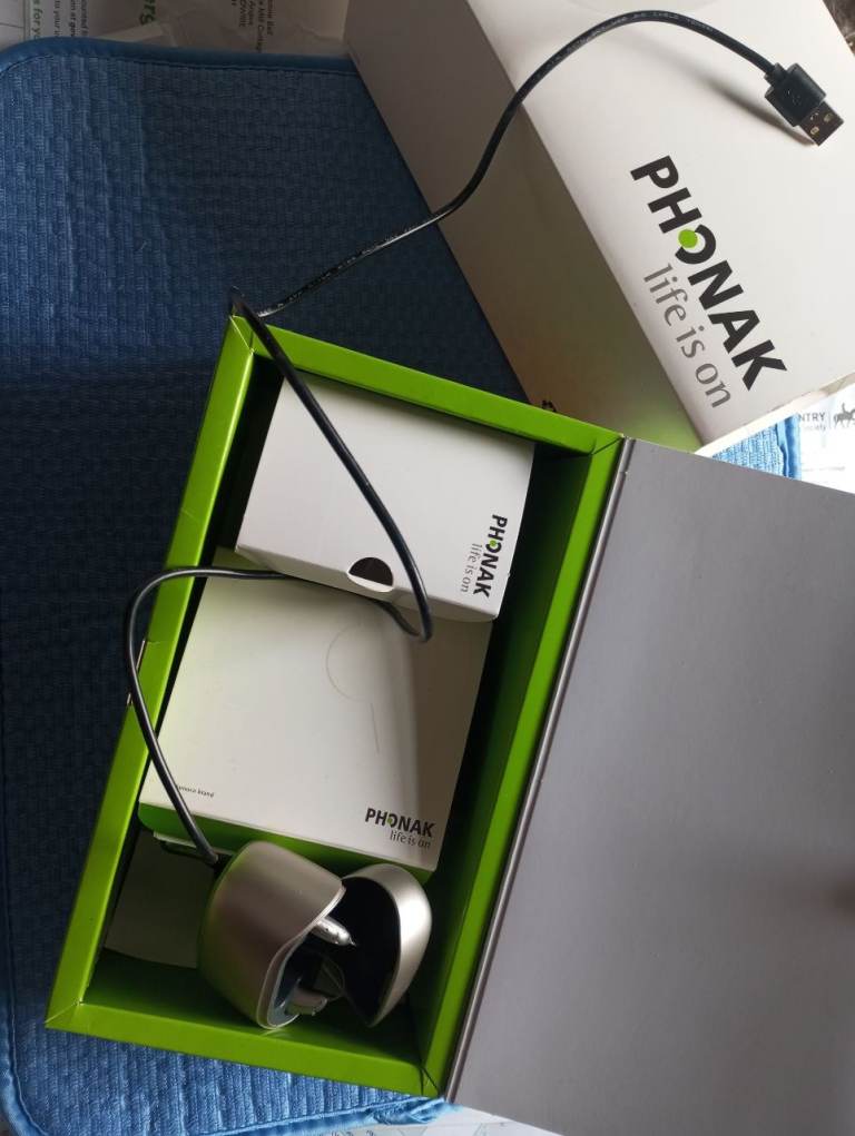 Pair of hearing aids, boxed
