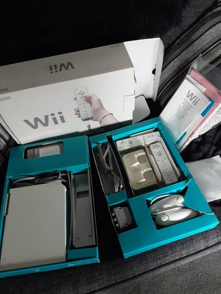 Nintendo Wii console, balance board plus 15 games