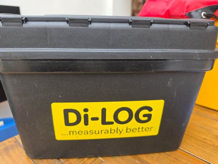 Di-log tester