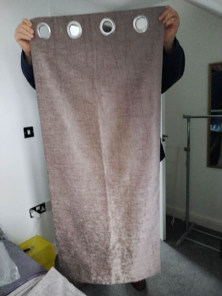 Pair of black out curtains in light brown/beige