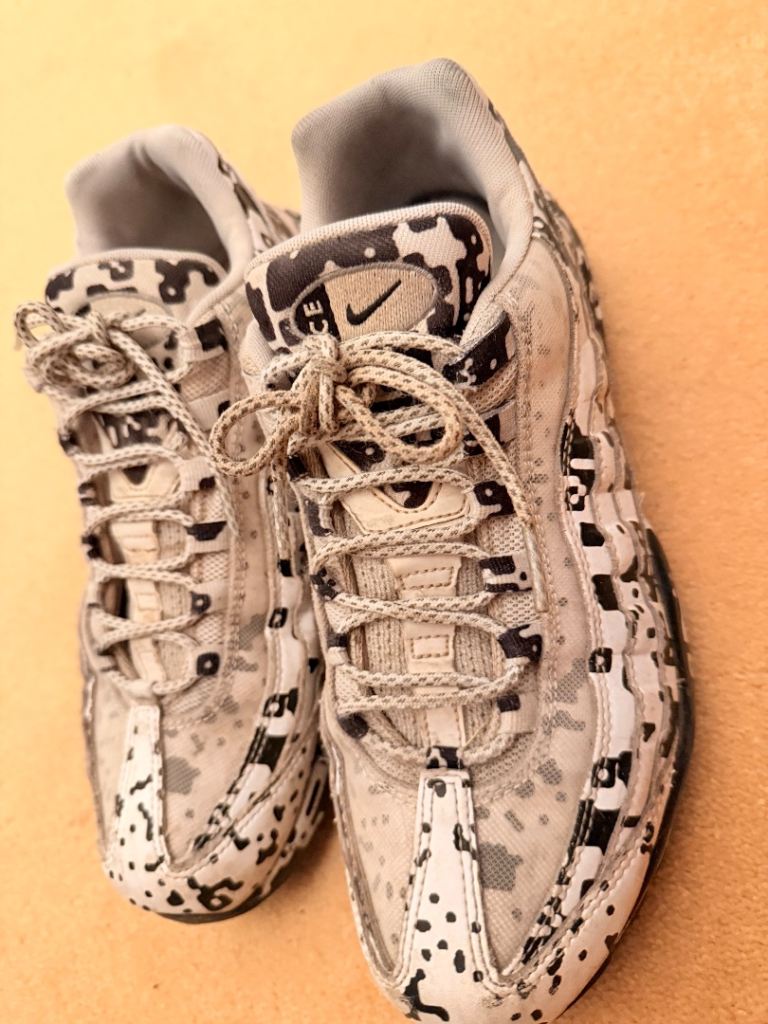 Nike white and black camo shoes 