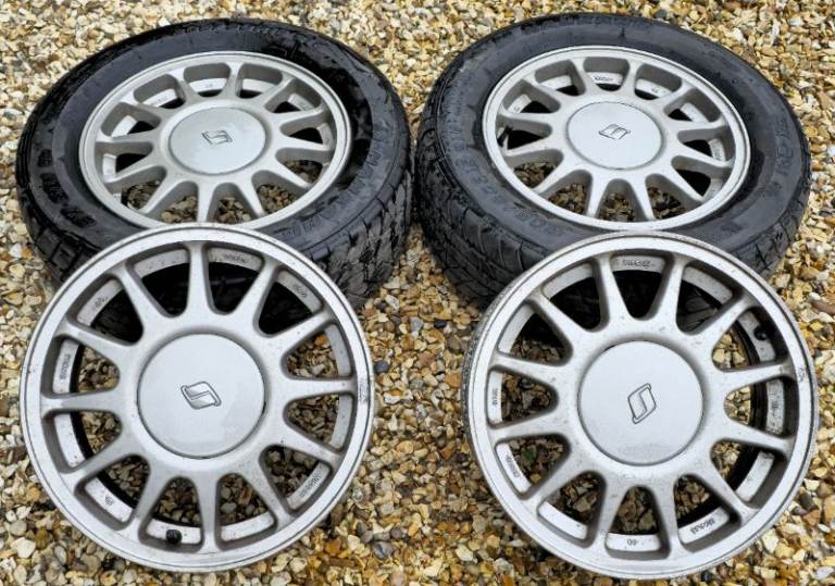 15" GENUINE NISSAN SKYLINE R32 (1989) ALLOY WHEELS + HUB CAPS 5x114.3 FULL SET