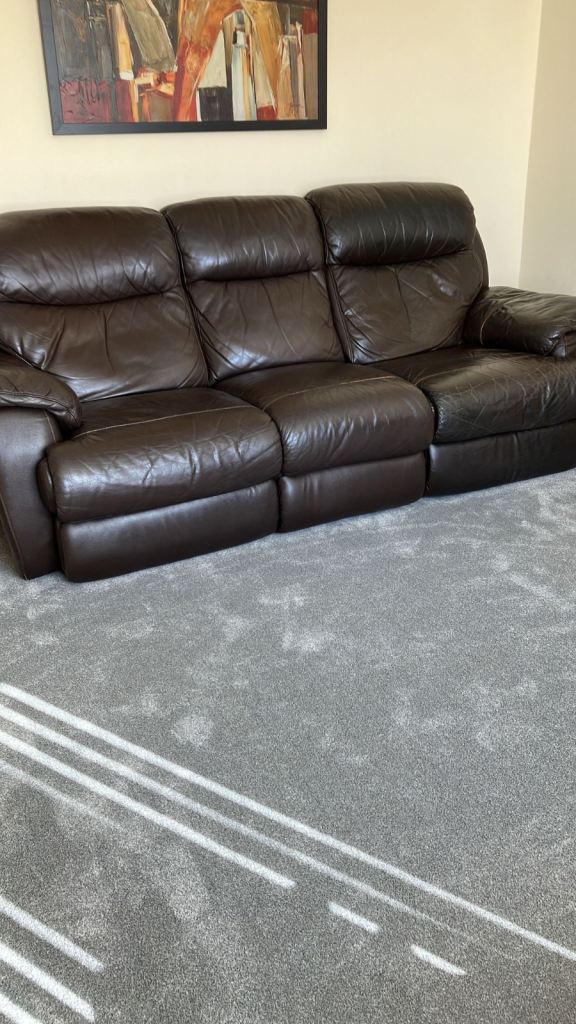 Brown leather three seater recliner 