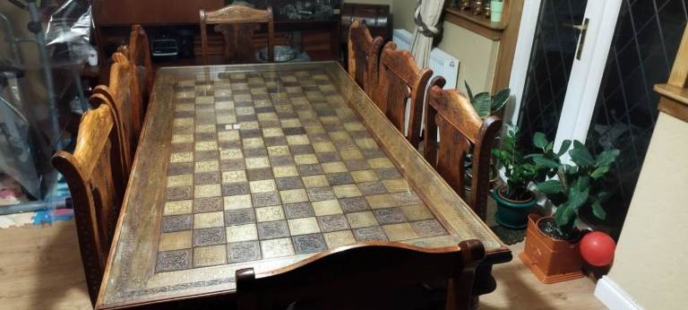 Wooden Dining table and 8 chairs 