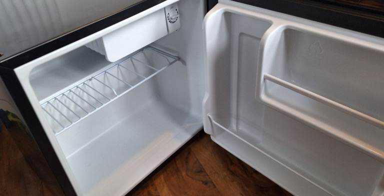 Russell hobbs table top fridge with small freezer new condition 