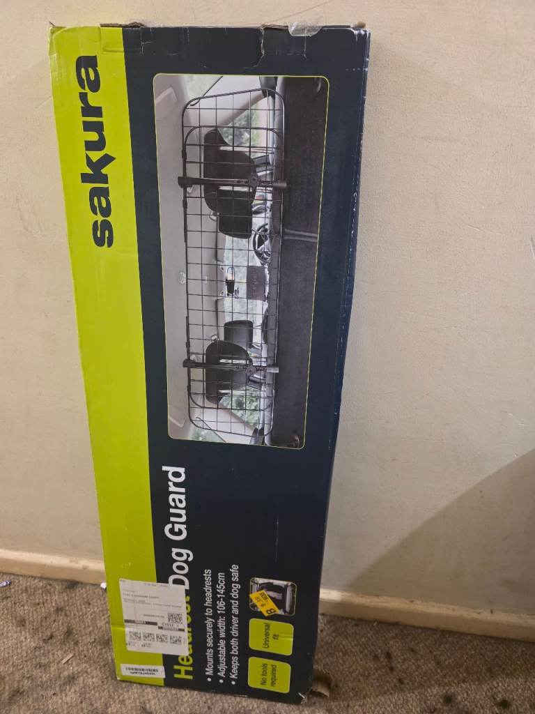 Sakura Headrest Dog guard for cars, never used - free to collect