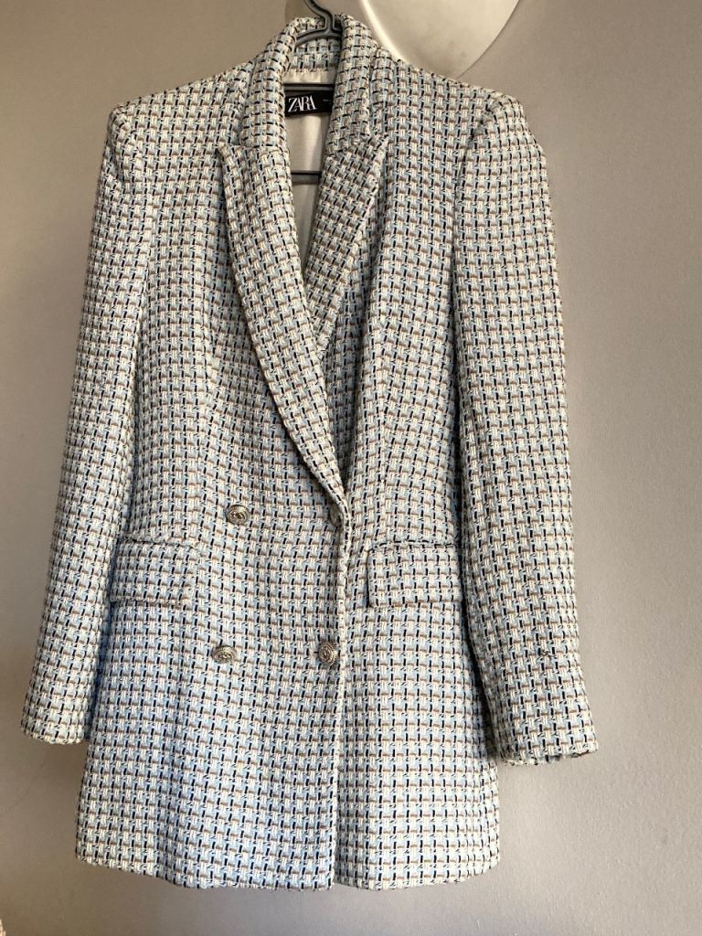 Lots of lovely woman’s clothes, mainly Zara . 