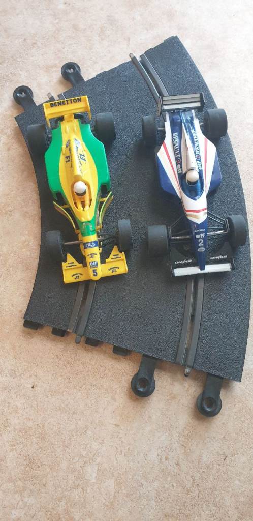 Scalaxtric cars. 2 x F1. Williams Renault and Ford Benetton. Hornby Hobbies and piece of track.