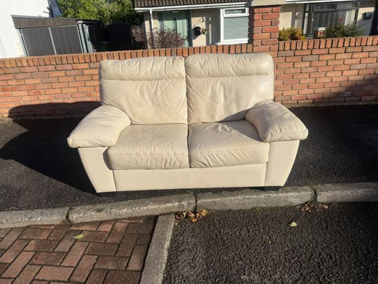 2 seater sofa in a cream leather £120