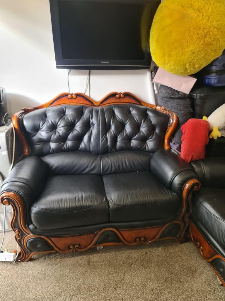 Black Leather Sofa Set with Wooden Frame – Good Condition