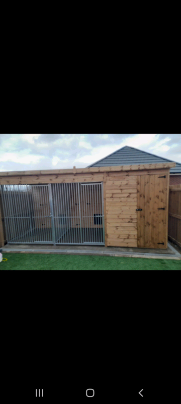 Double kennel with storage shed 