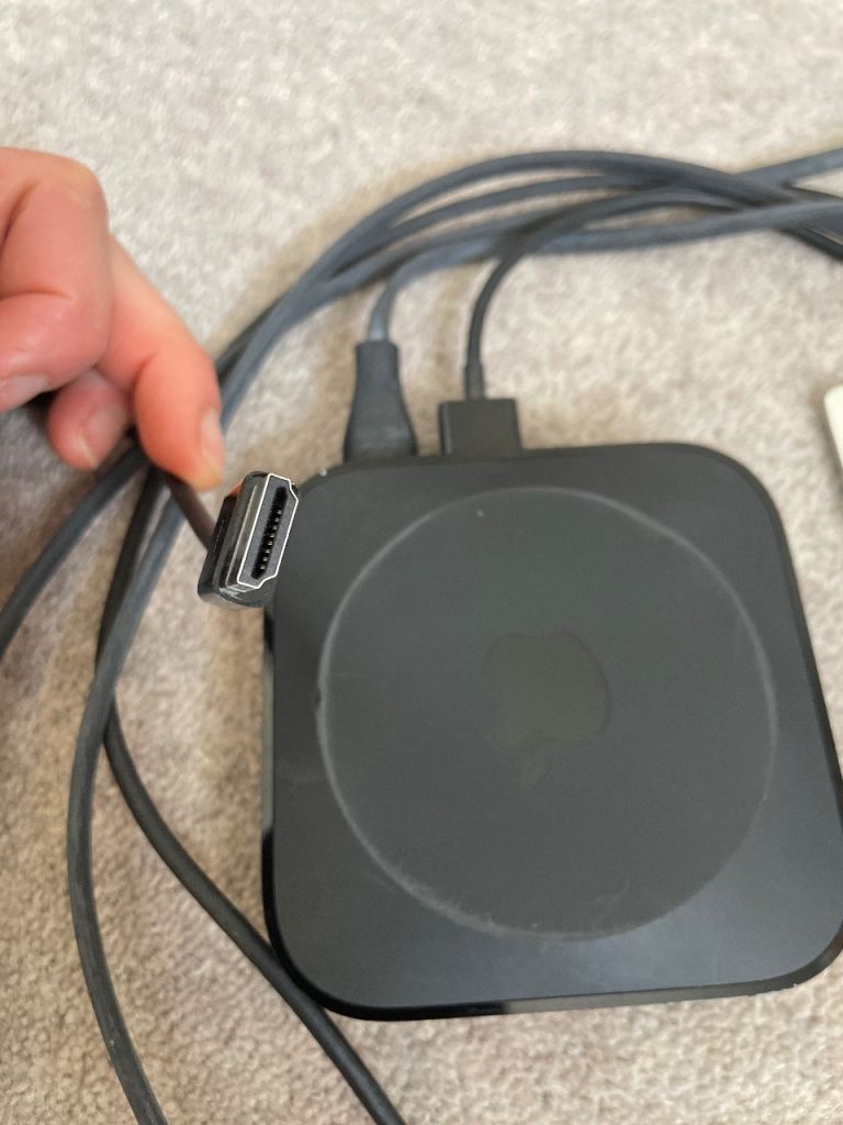 Apple TV box with remote 