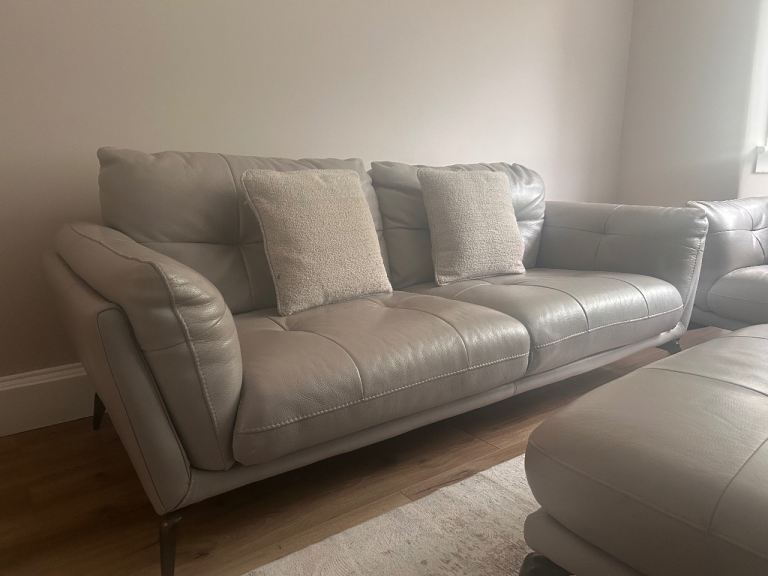 Two 3 seater sofas and footstool