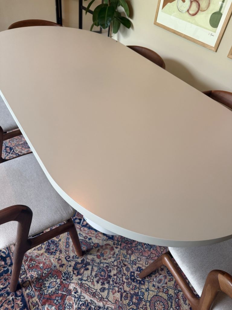 Dining table + chairs + rug