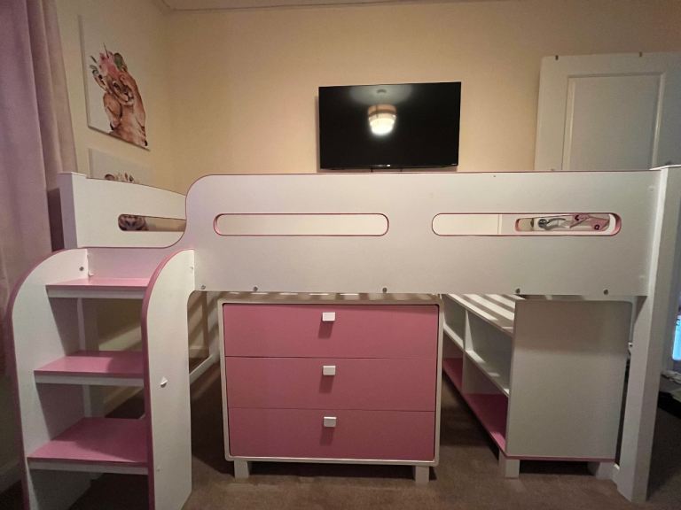 Pink and white cabin bed