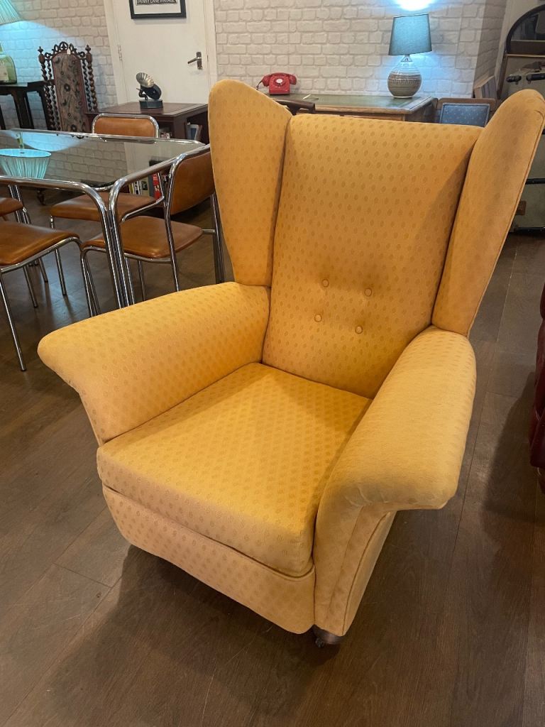 Parker Knoll wing back gold armchair, button back, cushioned seat, bun feet, very comfortable & vgc