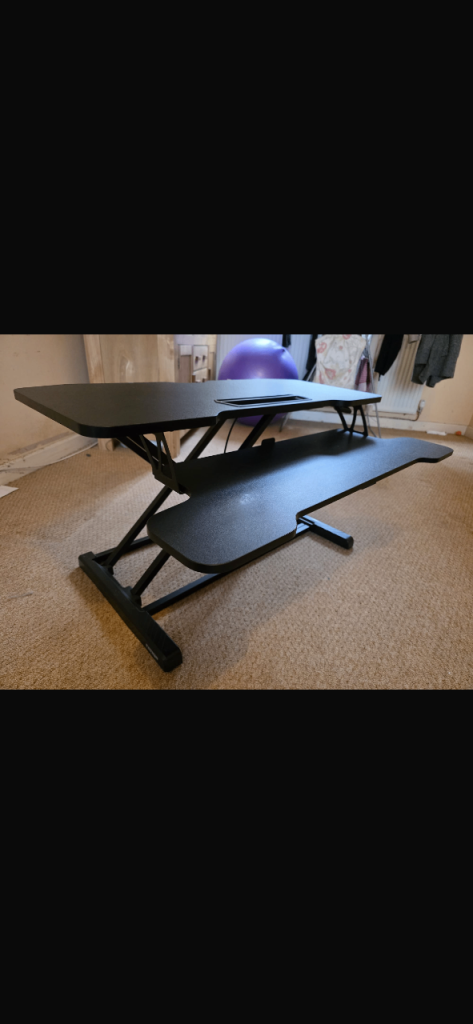 Rising Desk Topper for rising standing desk. 