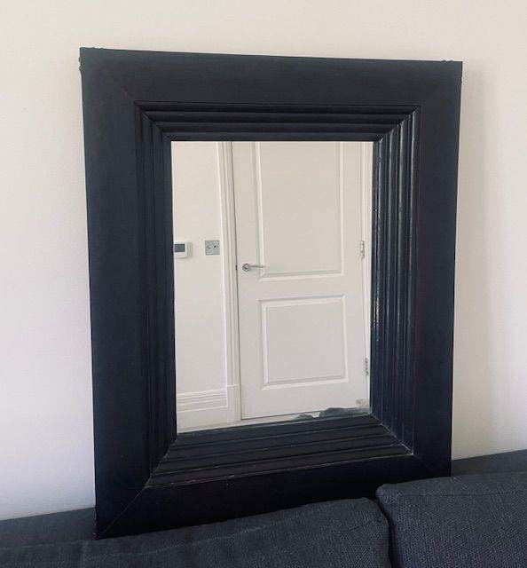 Large, dark-wooden square wall mirror from OKA