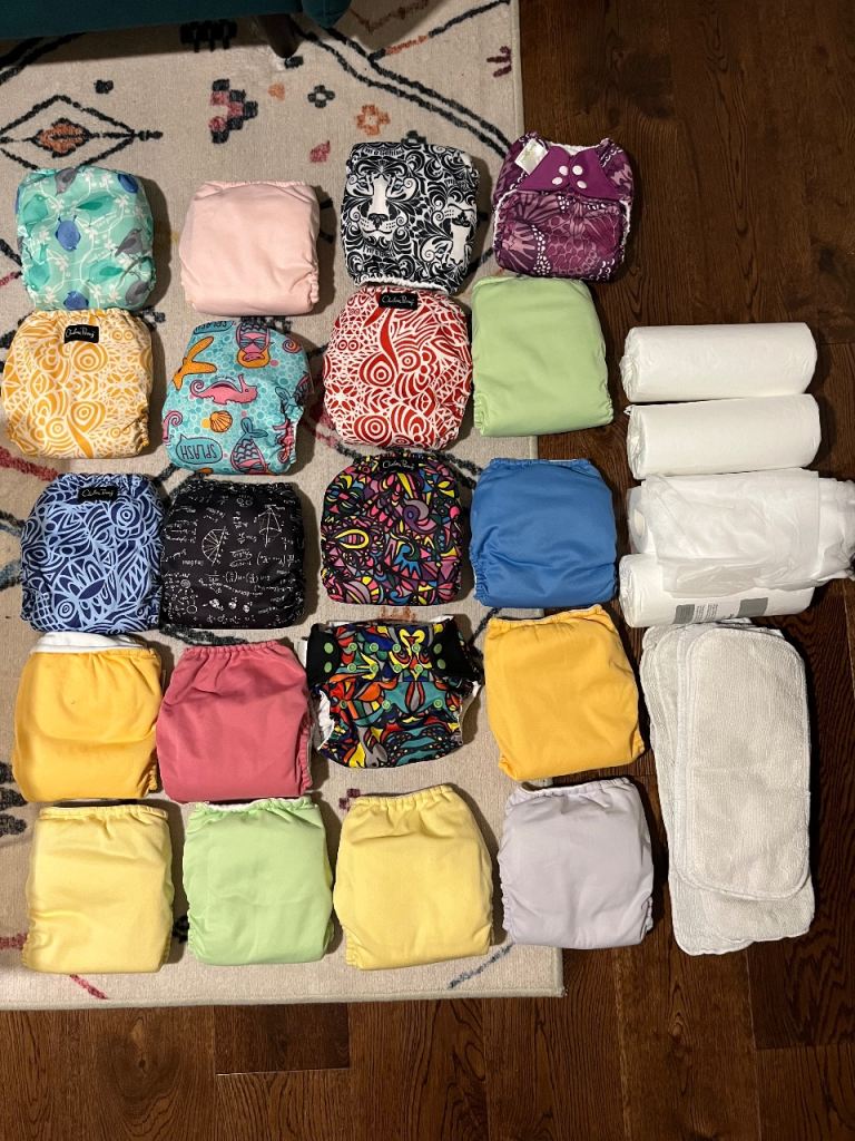 20 Reusable nappies with 45 washable pads