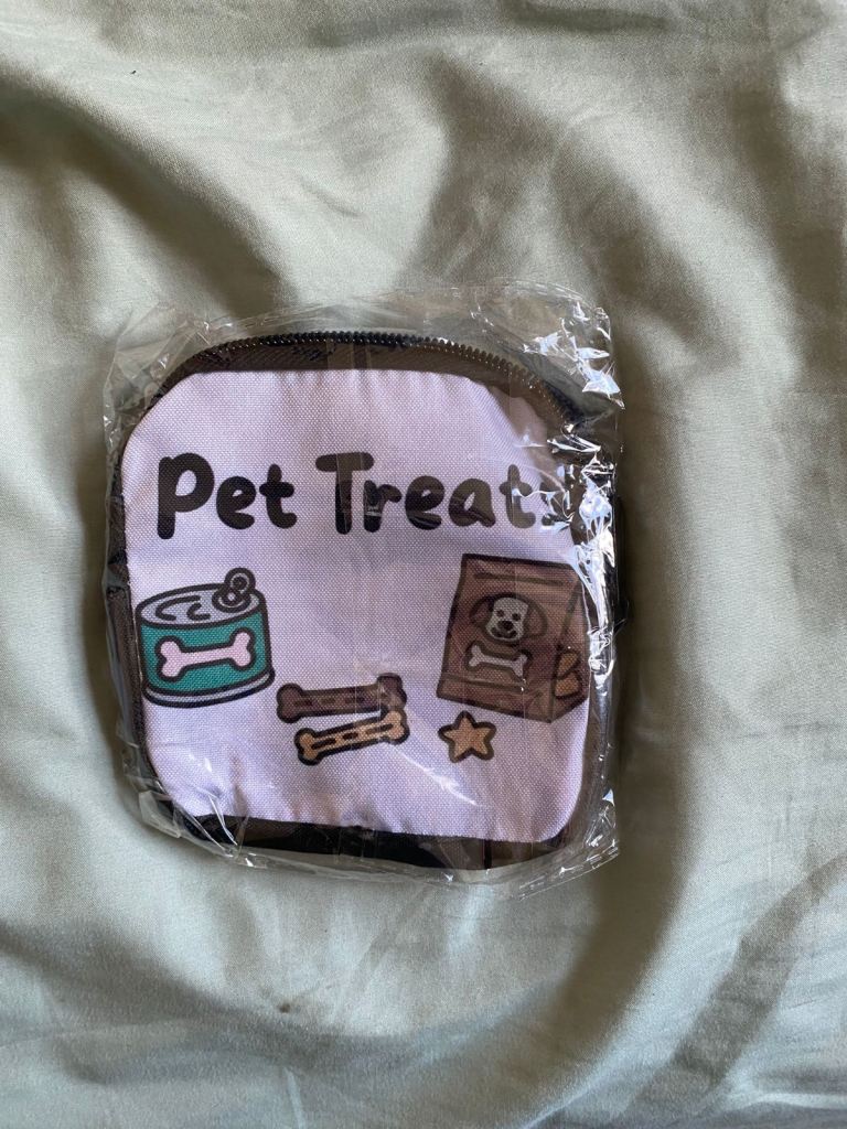Dog treat bag, clicker and sticker 