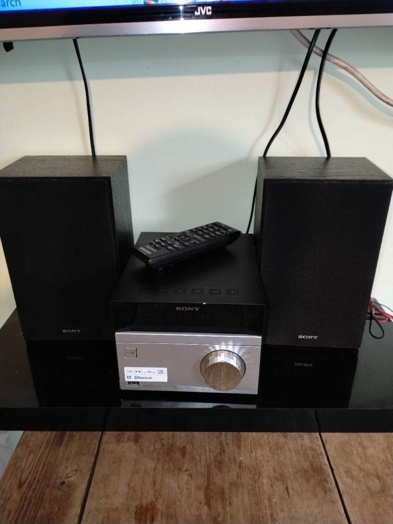 Sony CMT-SBT20 micro hi-fi system, which features a silver main unit and black speakers.
